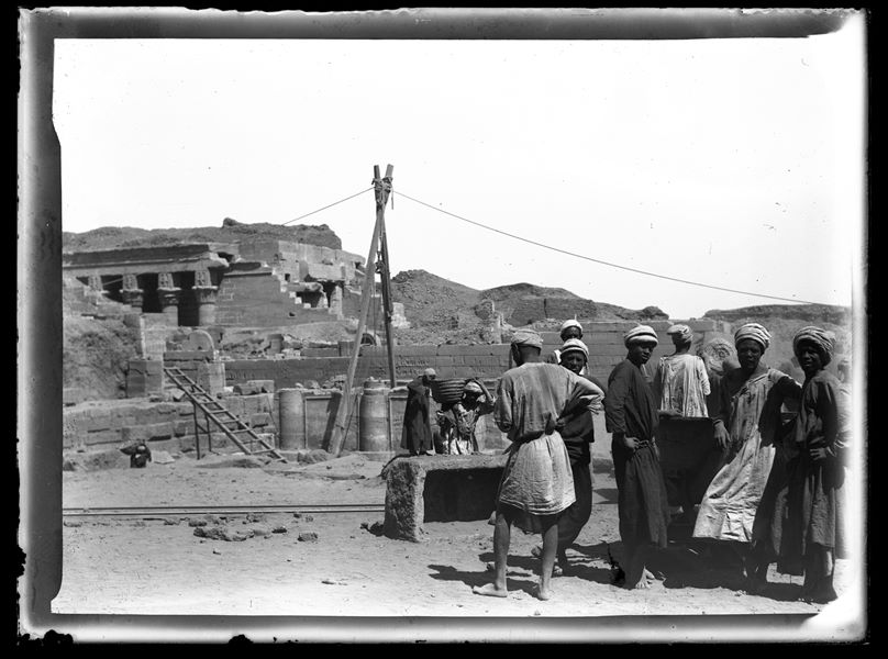 Egyptian workers excavating at the Temple of Hathor in Dendera, in the eastern fountain preceding the northern gate of the temple.