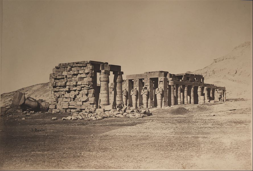 General view of the Ramesseum, West Thebes, built by Pharaoh Ramesses II. The Theban Mountain is visible in the background. The author's signature can be found at the bottom left.
