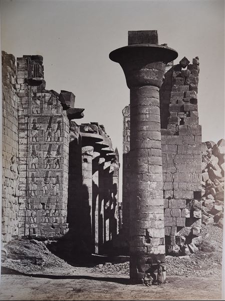 Slightly off-axis view through the second pylon and the Great Hypostyle Hall of the Karnak Temple Complex. In the centre, the only remaining column of the kiosk of Pharaoh Taharqa (25th dynasty, called the "Ethiopian" Dynasty). 