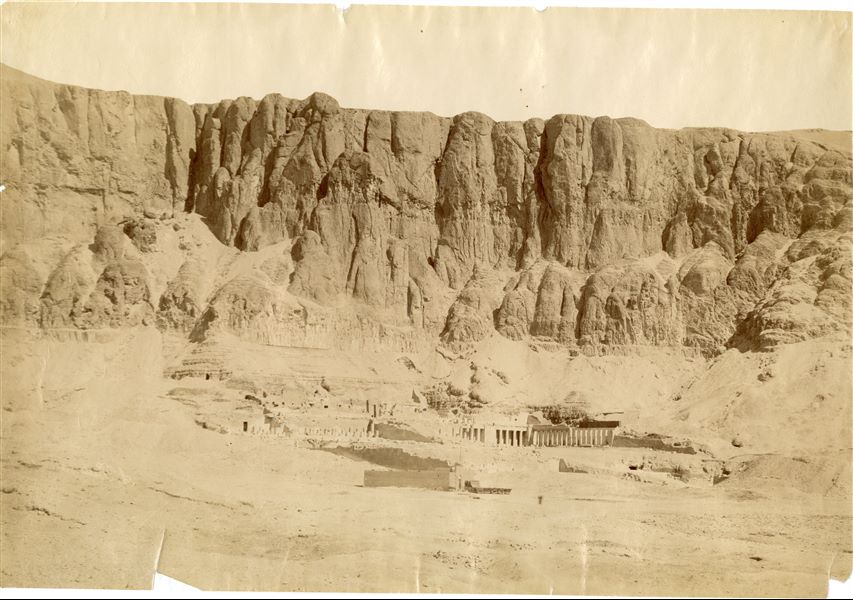 View of the remains of three temples near the site of Deir el-Bahari. From the left: the Temple of Montuhotep II, the Temple of Thutmose III and on the right, the better preserved Temple of Queen Hatshepsut. The author's signature is visible at the bottom left in mirrored writing. 