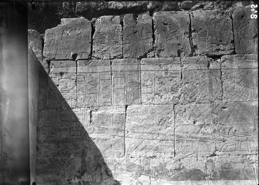 South side of the mortuary temple of Queen Hatshepsut at Deir el-Bahari. Wall scene from the portico in the middle terrace displaying the loading of tribute onto Egyptian ships at Punt. Photograph taken before restoration of the wall.
