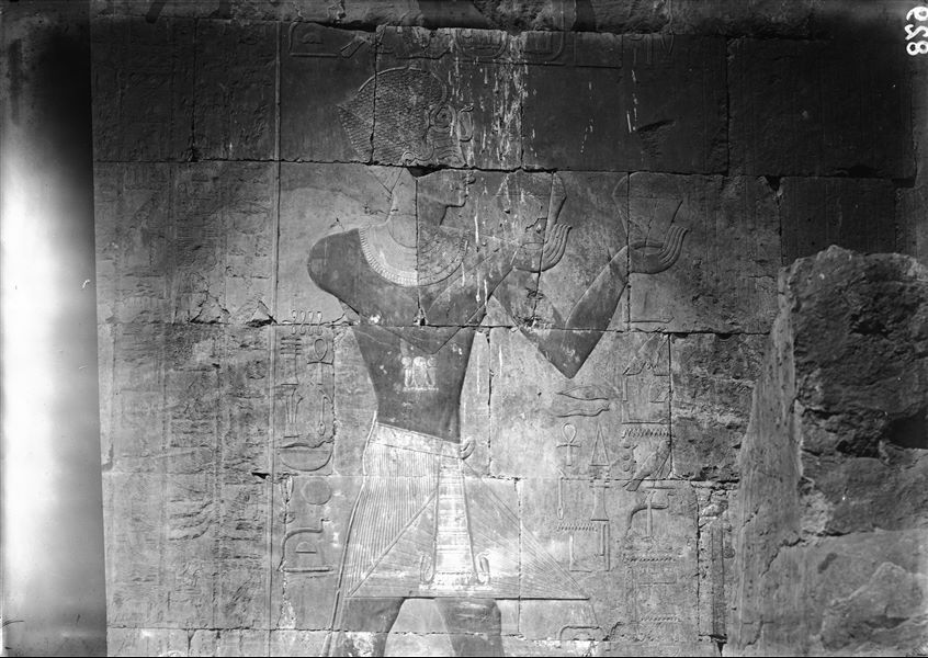 South side of the mortuary temple of Queen Hatshepsut at Deir el-Bahari. Wall scene from the portico in the middle terrace depicting Tuthmosis III offering incense to the sacred barque of the god Amun. 