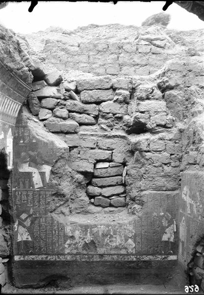 Inside the chapel of Maia, what remains of the decoration on the back wall can be seen. The two seated figures are Maia's parents, Khaemwaset and Mutnefret. Schiaparelli excavations.