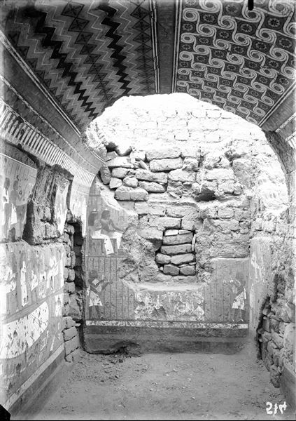 Interior view of the chapel of Maia, what remains of the back wall can be seen. Schiaparelli excavations. 