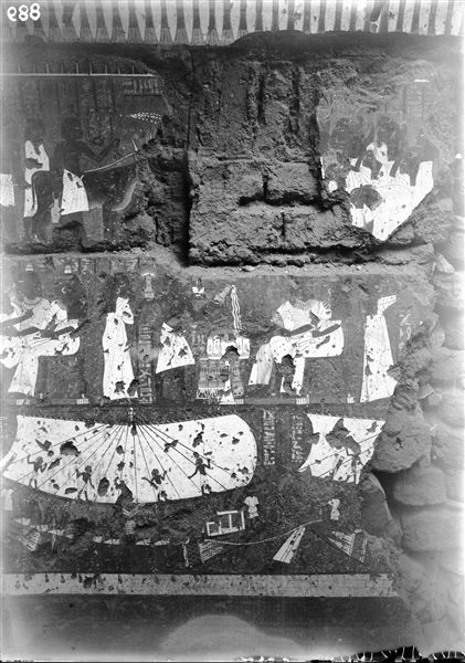 Left sidewall from the chapel of Maya. In the upper register, the pair of oxen that tow the sarcophagus (the latter not visible here), and a group of eight mourning women. In the centre, an offering scene to the deceased couple. In the lower register, there is a sailboat that precedes the one where the deceased couple are seated. Also visible is the stern of a third boat, including a part of its sail. Schiaparelli excavations. 
