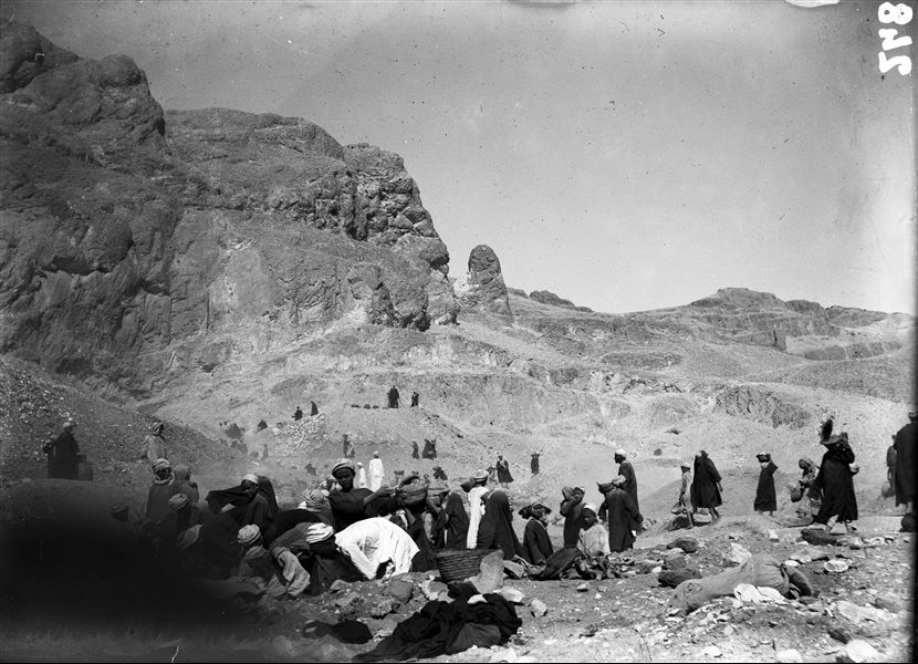 Excavations towards the northern end of the necropolis. The photograph shows teams of workmen working separately in different excavation areas. Schiaparelli excavations. 