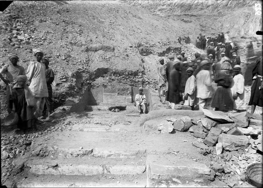 Excavations along the slope of the mountain, on the right side of the temple of the goddess Hathor. Relief from chapel G, with the cartouches of Seti II, inscribed over those of Amenmesse (S.06136). Schiaparelli excavations. 