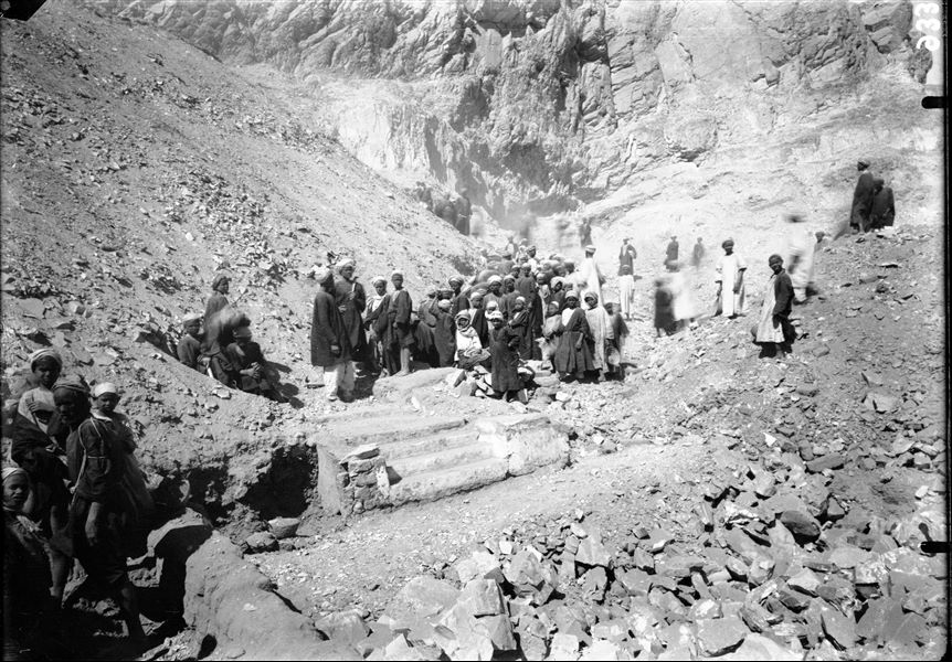 Excavations along the slope of the mountain, on the right side of the temple of the goddess Hathor. Stairs leading to chapel G, with cartouches of Seti II. Schiaparelli excavations. 