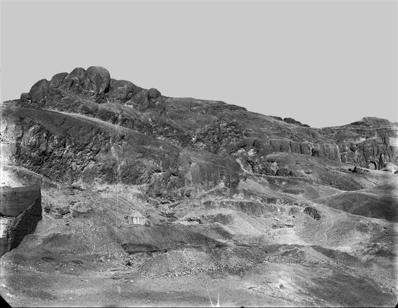 General view of the northern area of the necropolis, prior to the start of excavations. Visible at the bottom are the walls of the temple dedicated to the goddess Hathor. Schiaparelli excavations. 