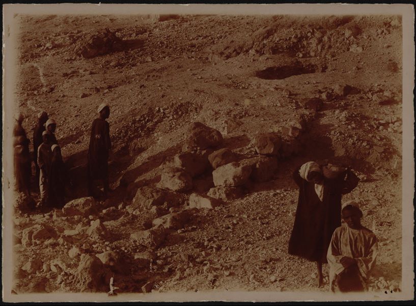 Excavating north of the temple of Hathor. This print on paper has been toned with sepia. Schiaparelli excavations.