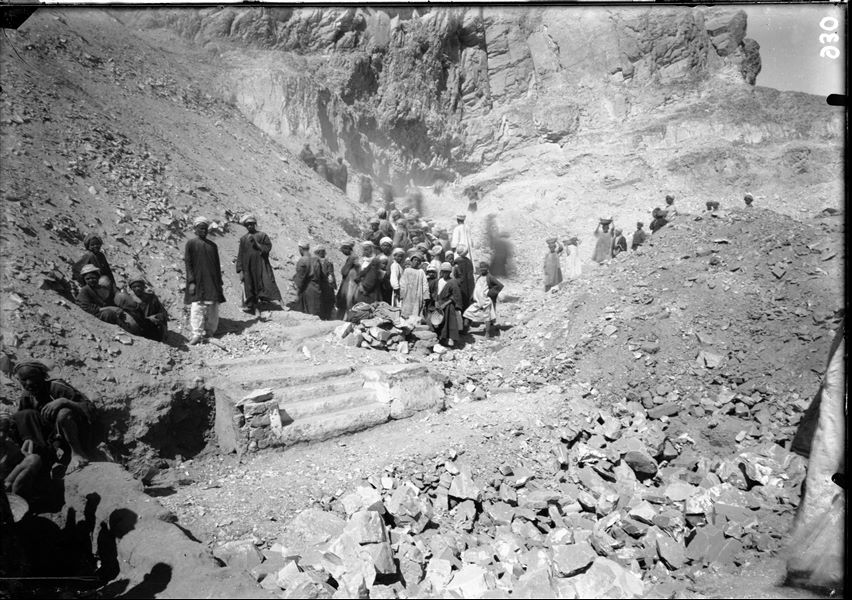 Excavations along the slope of the mountain, on the right side of the temple of the goddess Hathor. Stairs leading to a chapel G, with cartouches of Seti II. Schiaparelli excavations. 