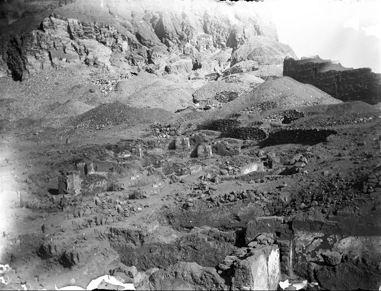 Excavations on the left side of the temple, among the remains of some houses built inside the boundary wall of the village (house number 2 - NW). The image is not very clear as two consecutive shots were taken using the same photographic plate. Schiaparelli excavations. 