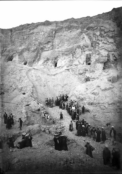 Excavations in the northern area of the necropolis, west of the temple of the goddess Hathor, in the area of the tomb of Kha (TT8).  Visible in the background are the entrances of several tombs, from left to right: TT10, 322, 323 and 330 A and B. Schiaparelli excavations. 
