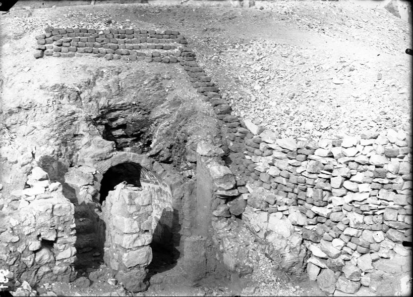 ​Excavations in the northern area of the necropolis, west of the temple of the goddess Hathor. Funerary chapel of tomb of Amenemipet (TT215). The barrel-shaped structure of the chapel was originally covered by a small mud-brick pyramid Schiaparelli excavations. 