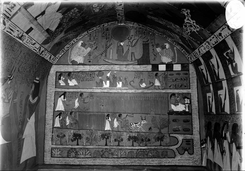 East wall of the tomb of Sennedjem (TT1). Below the solar barque with Re-Horakhty depicting a baboon on either side of the vessel; the lower registers present scenes of life in the fields of the Netherworld, referring to Spell 110 of the Book of the Dead. 