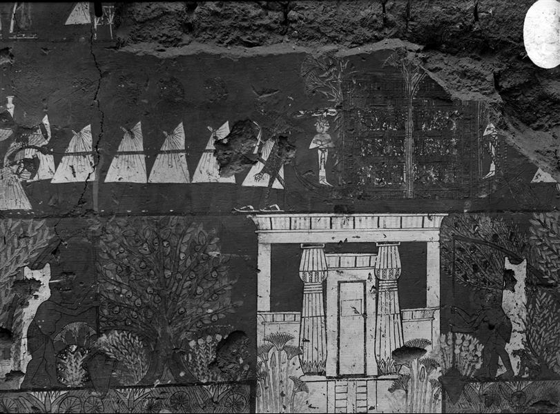 East wall, south side, from the transverse chamber of the tomb of Ipuy (TT 217). Depicted is a scene that is no longer visible today. Detail of a temple in the middle of some trees. 