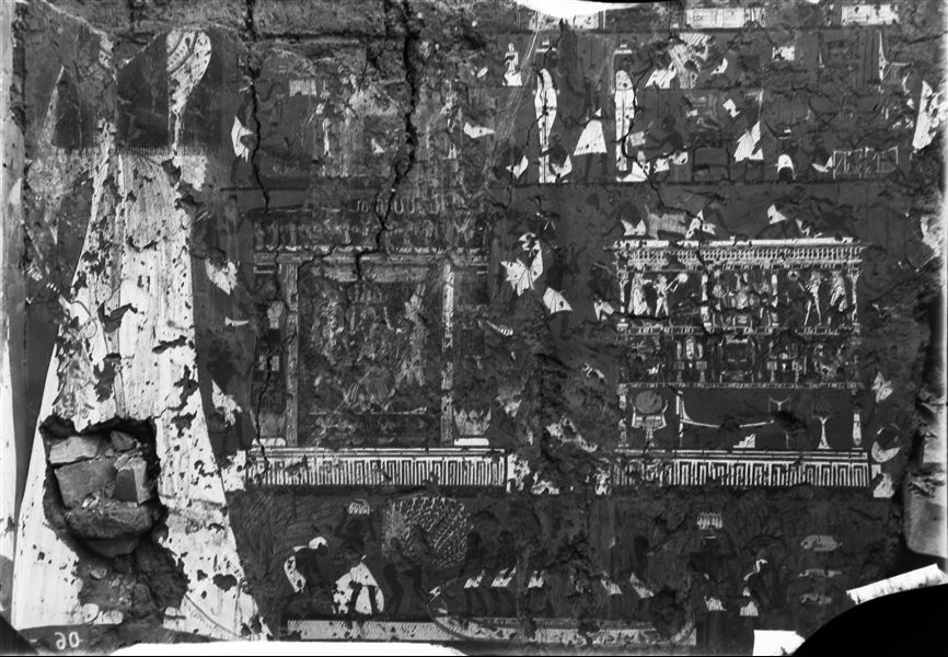North wall from the transverse chamber of the tomb of Ipuy (TT 217). On the left, the wife of Ipuy performs libations with her husband to Anubis and Ptah-Sokar (both  Ipuy and the god are on the west wall, north side, and not visible in this photograph). The image shows three of the four registers forming part of this wall scene, the two central ones are related to funeral preparations and the lowest register shows a fishing scene.  