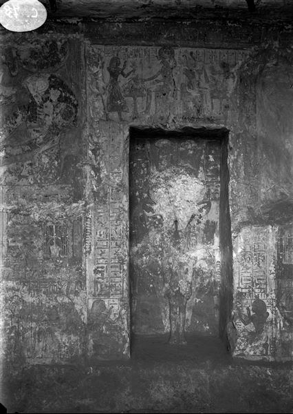 West wall (at the back) from the tomb of Qen (TT 4). A niche in the middle of the wall with a statue inside.  
