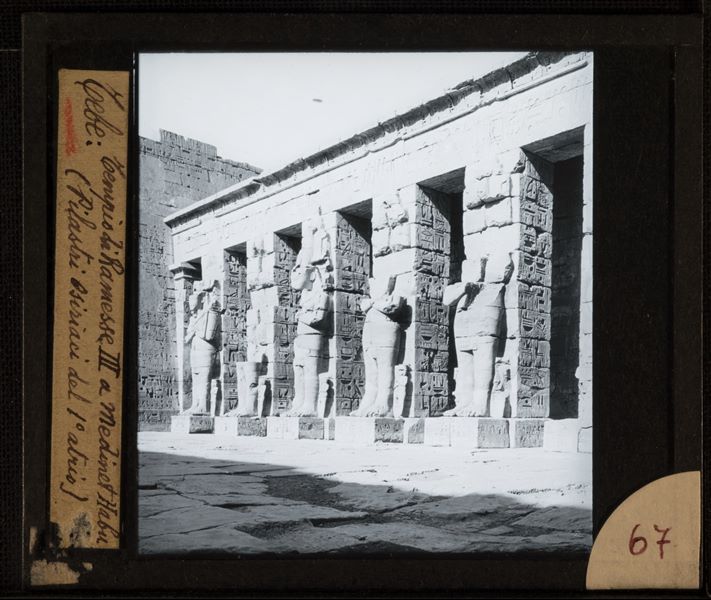 Osiride pillars in the first courtyard of the Medinet Habu temple complex built by Pharaoh Ramesses III at Thebes, on the west side of the Nile River.