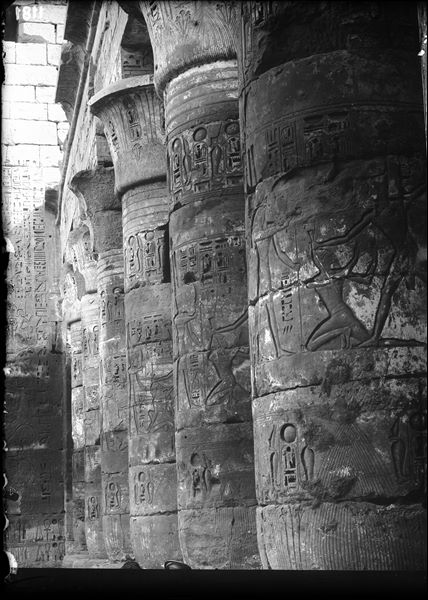 View of the colonnade, south side, east wall, in the first court of Ramesses III’s temple.