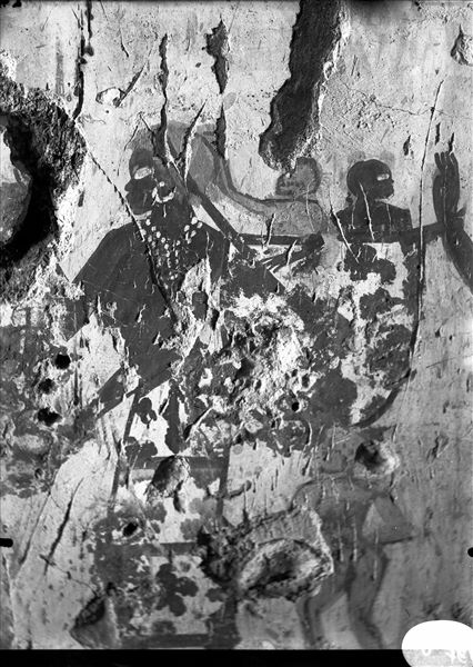 West wall, north side of the transverse chamber from the tomb of Horemheb (TT78). Detail from the scene in the fourth register from the top, depicting a Nubian woman with two children paying their respects to Horemheb. 