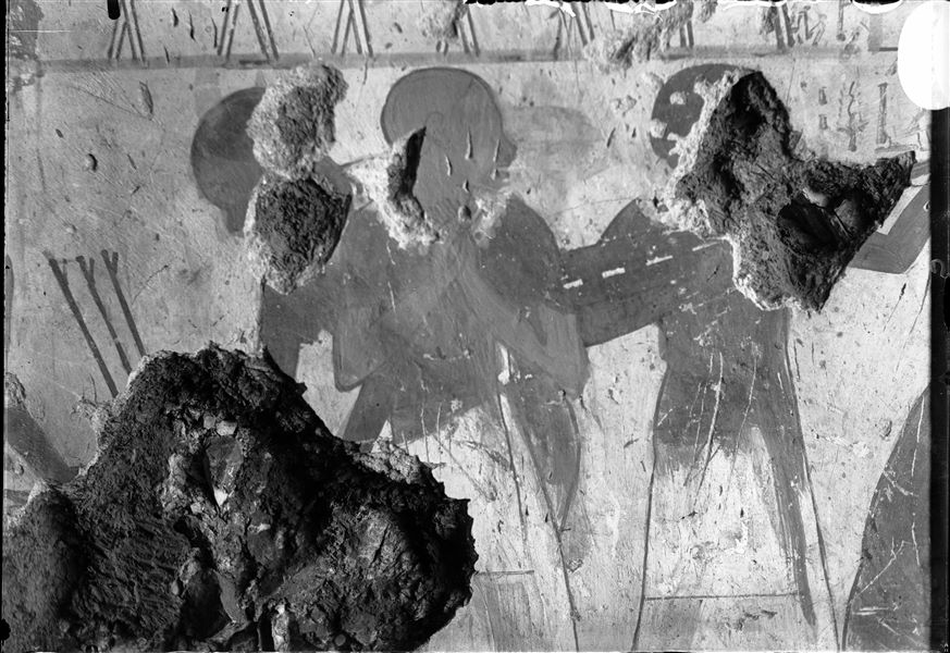 Detail from a wall scene, probably from the tomb of Horemheb (TT78). Three people are represented, however quite damaged. 