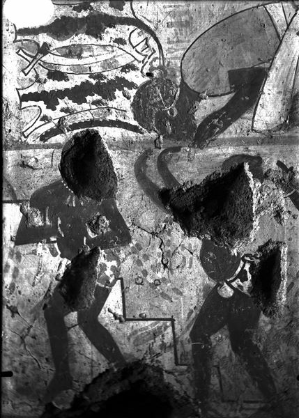 Parete ovest, lato nord della camera trasversale della tomba di Horemheb (TT78). È rappresentato un dettaglio della parete, nel IV e V registro dall’alto, una scena di tributi a Horemheb, e sotto, una scena di danzatori nubiani. 