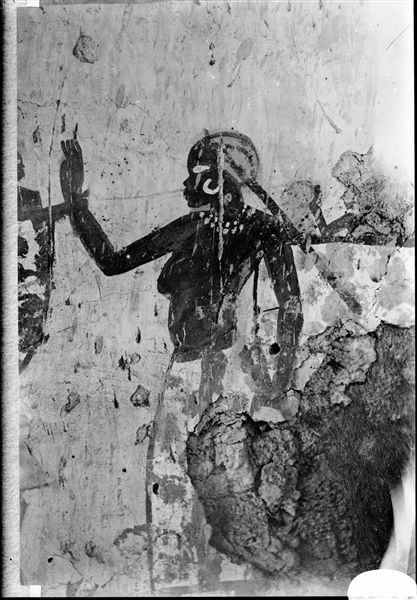 West wall, north side of the transverse chamber from the tomb of Horemheb (TT78). Detail from the scene in the fourth register from the top, depicting a Nubian woman paying her respects to Horemheb. 