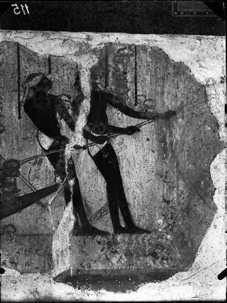 North wall from the second chamber in the tomb of Horemheb (TT78). Detail of two men pulling a fishing net, full of fish (which are not visible in this photograph). 