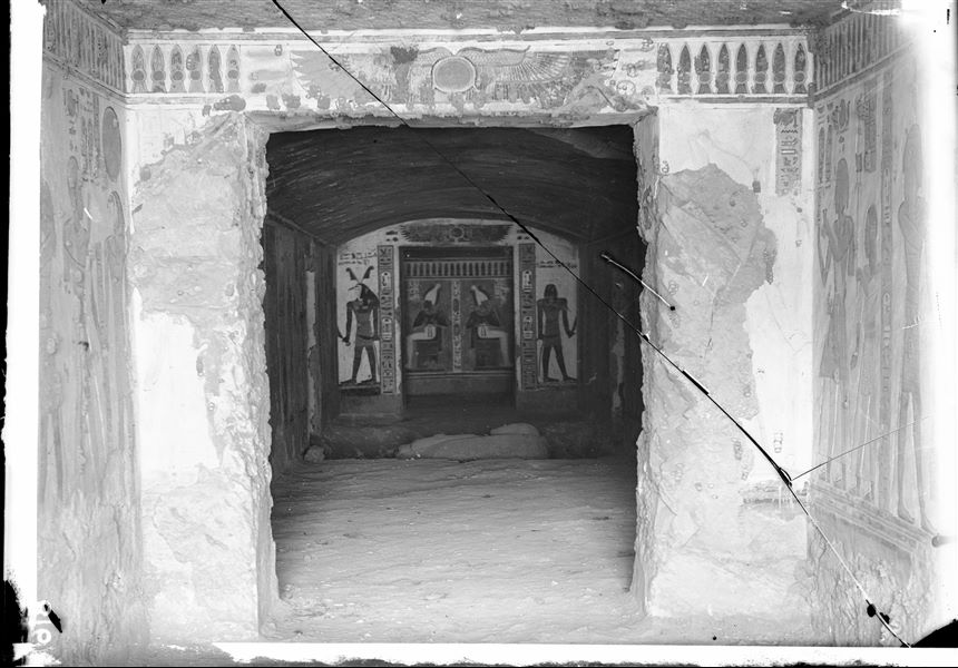 Vestibule and burial chamber of the tomb of Prince Khaemwaset (QV44) after the removal of the sarcophagi dating to later dynasties. In the burial chamber the granite sarcophagus of its original owner Prince Khaemuaset is visible; however it is missing its lower part (S. 5215). Schiaparelli excavations.