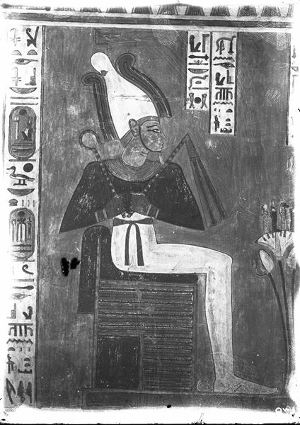 South wall (back, scene 20) of the rear annex from tomb QV44. The god Osiris is depicted facing the goddesses Nephthys (left) and Serket (right) who are not visible in this photograph. 