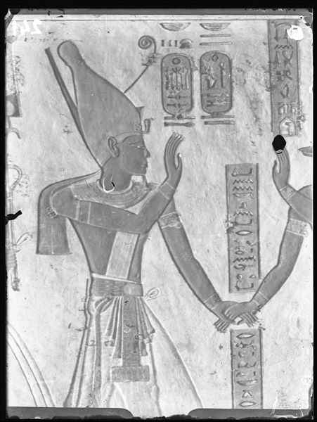 East wall of the vestibule (scene 3) from tomb QV44, depicting Ramesses III who is holding the hand of the god Anubis (the latter not visible in this photograph). Schiaparelli excavations.