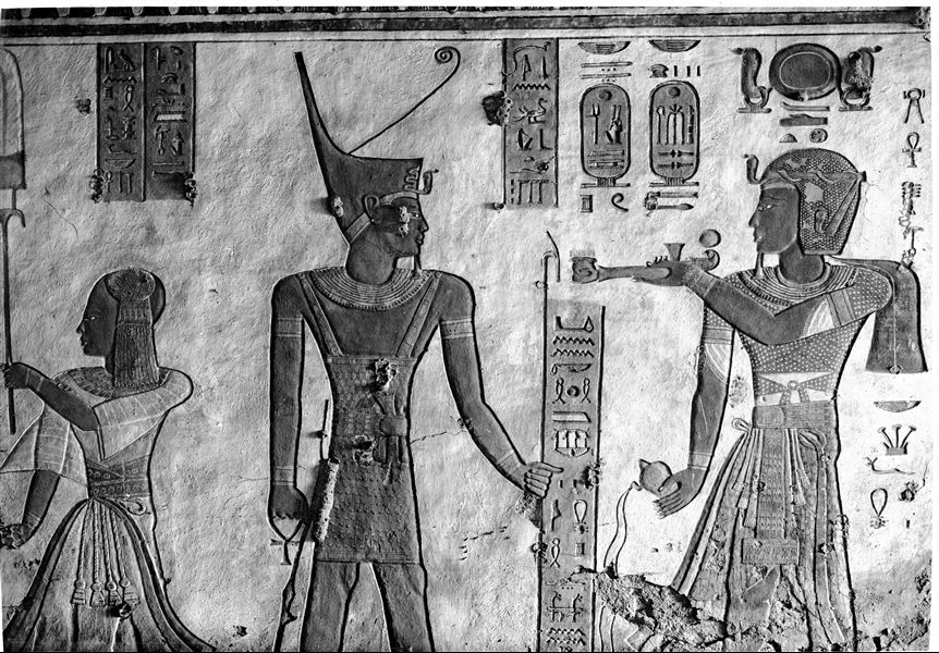 West wall of the vestibule (scene 5) from tomb QV44, depicting Ramesses III facing the god Geb. On the left is the young Khaemwaset. Schiaparelli excavations.