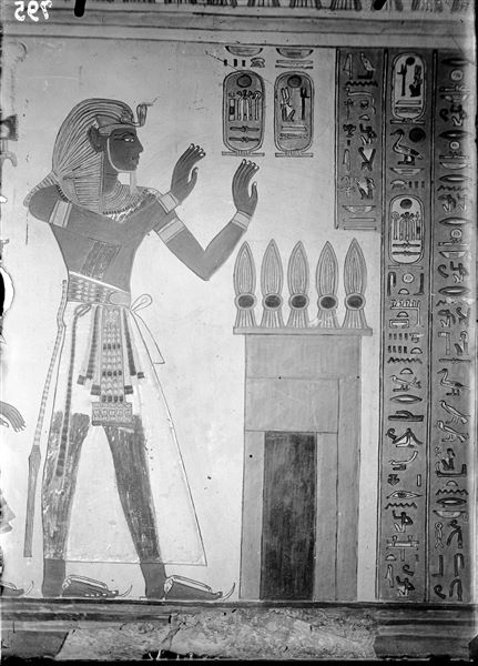 Burial chamber from the tomb of Amonherkhepeshef (QV55). The pharaoh is represented in front of one of the portals, followed by the text from Spells 145-146 of the Book of the Dead. Schiaparelli excavations.