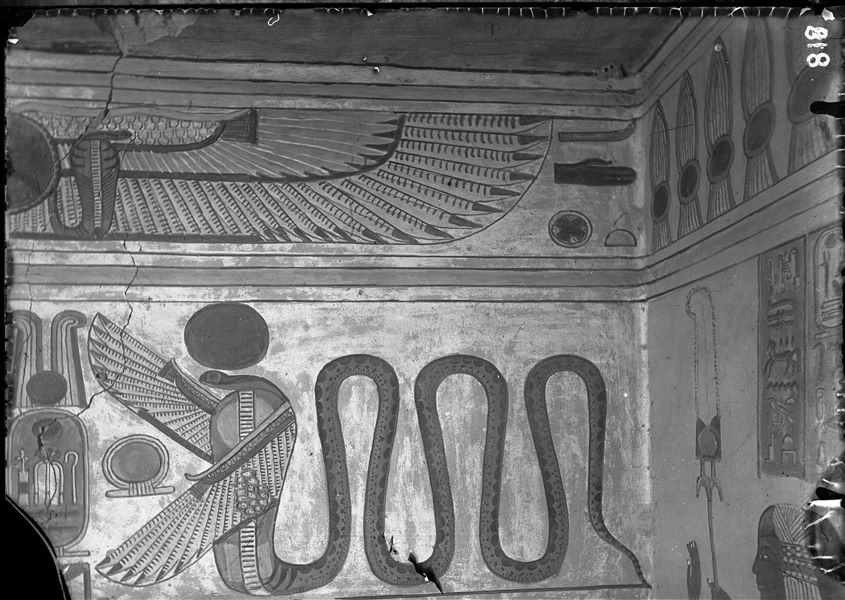 Wall scene from the tomb of Amonherkhepeshef (QV55).  Lintel from the entrance to the rear annex, from the burial chamber. A winged serpent with a solar disk is visible, on the right is the figure of Amonherkhepeshef. Schiaparelli excavations. 