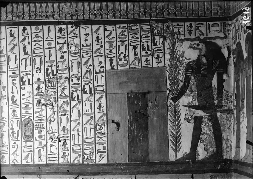 Burial chamber, south-west corner, scene 29. The representation of Spell 144 of the Book of the Dead continues. The first portal, which Nefertari must pass through, can be seen as well as her guardians.