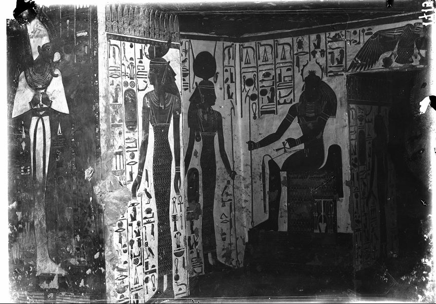 Vestibule, north-east corner, scenes 9 and 10. The goddess Isis accompanies Nefertari (not visible in this photograph) towards the god Khepri who is represented on the east wall, north side of the vestibule. On the right is the access to the first eastern annex (alcove). 