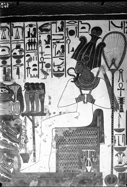 First eastern annex (alcove), east wall, scene 18. Detail of the god Osiris seated and facing north (left), in the act of receiving offerings from Nefertari, not visible here.