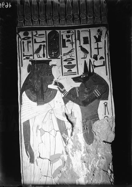 View of pillar D, side d, from the burial chamber. Queen Nefertari on the left and the god Anubis on the right can be seen. 