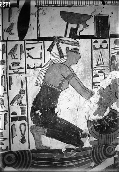 Descending corridor, east wall, scene 27. Detail of the goddess Nephthys kneeling. The inscriptions shown, which are partially damaged, are benevolent expressions uttered by the deity to Nefertari.