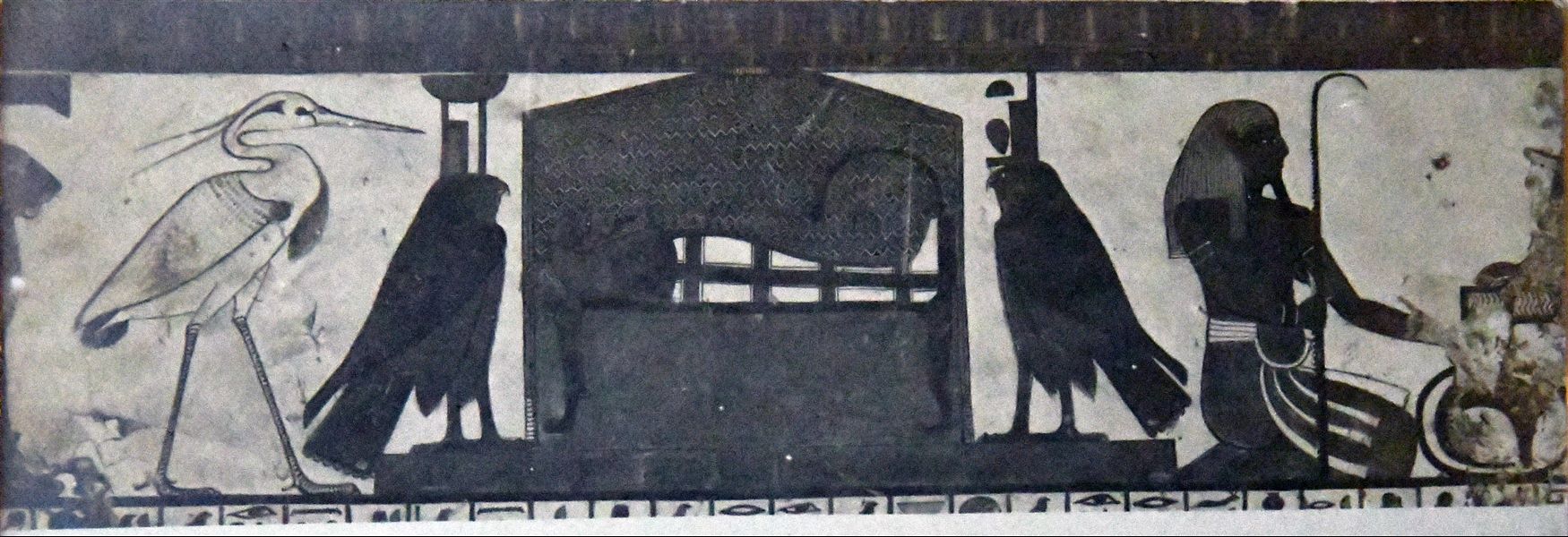 Photograph taken inside the tomb of Queen Nefertari (QV66). West wall of the antechamber, upper register, scene 3. The mummy of the Queen is placed on a bed between two falcons, representing the goddesses Nephthys and Isis. On the left, there is the Benu bird, symbol of the incarnation of Ra’s soul. Angelo Sesana Archive. 