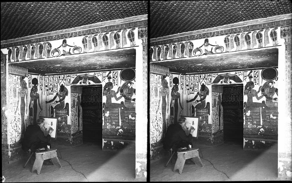 Vestibule, north-east corner, scenes 9 and 10. The goddess Isis accompanies Nefertari (not visible in this photograph) towards the god Khepri who is represented on the east wall, north side of the vestibule. In the centre is the access to the first eastern annex (alcove). The identity of the draughtsman photographed here is not known for certain.
