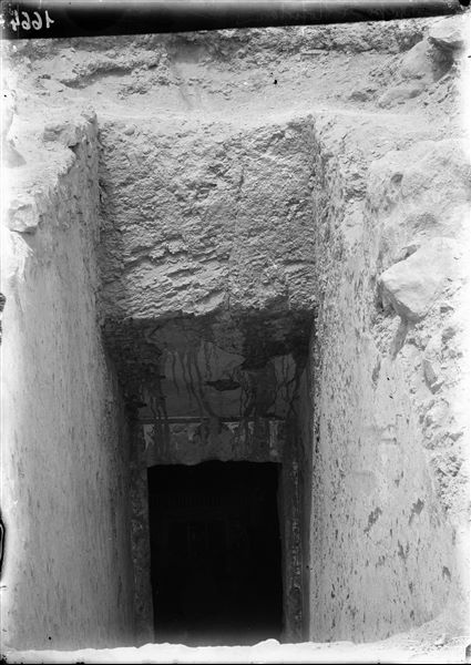 Entrance to the tomb of Nefertari at the time of its discovery. Photographed from the descending steps. Schiaparelli excavations. 