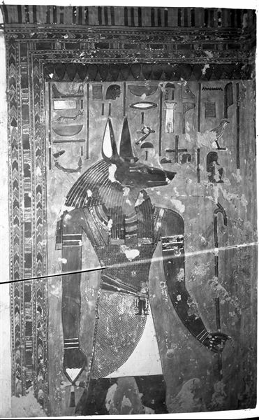Wall decoration of the antechamber, east wall, south side, scene 6, with the god Anubis facing the entrance to the tomb.