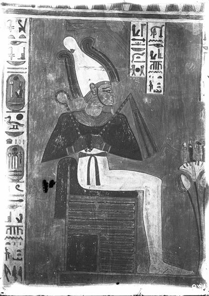 South wall (back, scene 20) of the rear annex from tomb QV44. The god Osiris is depicted facing the goddesses Nephtys (left) and Serket (right) who are not visible in this photograph. 