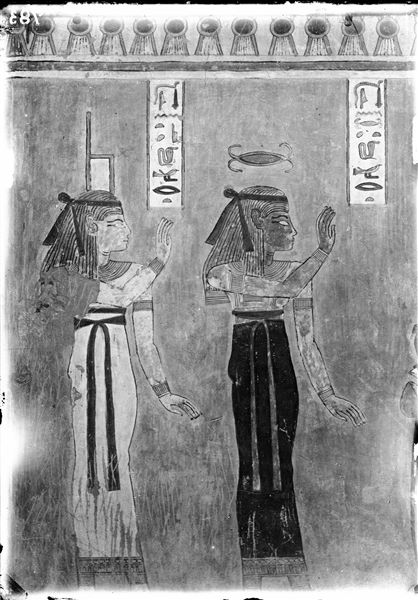 South wall (back, scene 20) of the rear annex from tomb QV44. The goddesses Isis (left) and Neith (right) are depicted facing Osiris - who is not visible in this photograph. Schiaparelli excavations.