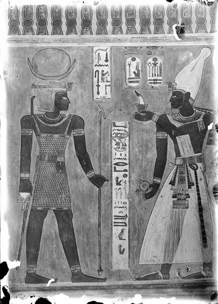 West wall of the rear annex (scene 19) from tomb QV44. Pharaoh Ramesses III is shown presenting offerings to the god Shepsi. In his left hand he holds an incense burner and with his right hand he pours a libation. Schiaparelli excavations.