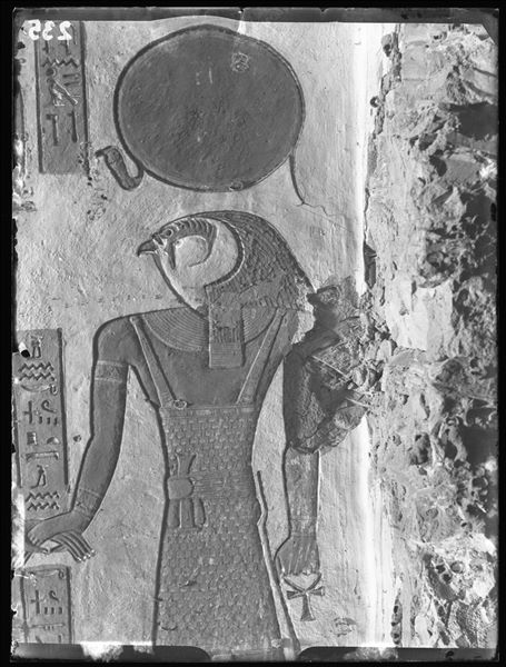 East wall of the vestibule (scene 3) from tomb QV44, depicting the god Re-Horakhty who is holding the hand of Ramesses III (the pharaoh is not visible in this photograph). Schiaparelli excavations. 