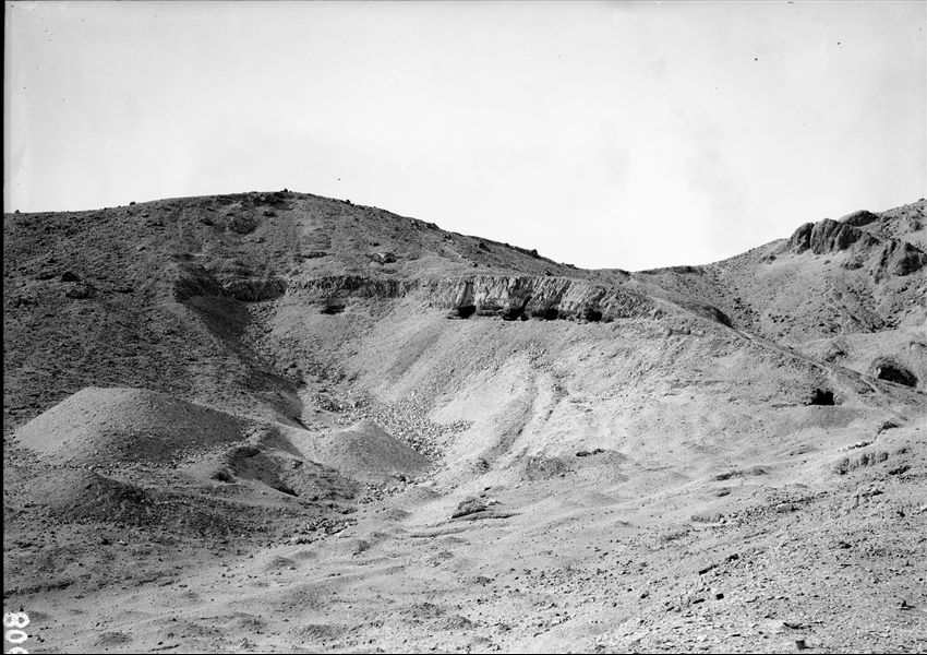 Results from the excavations in the small valley where the tomb of Prince Ahmose (QV88) was found. (Original label: at the end of the smaller valley after excavations). Schiaparelli excavations.