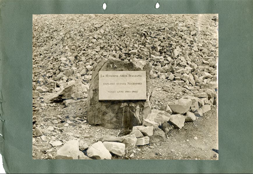Photograph of the marble plaque commemorating the Italian excavations in the Valley of the Queens between 1903 and 1905, placed next to the pathway near the tomb of Princess Ahmose, (QV 47) towards the bottom of the valley. Today, the plaque no longer survives. Schiaparelli excavations.